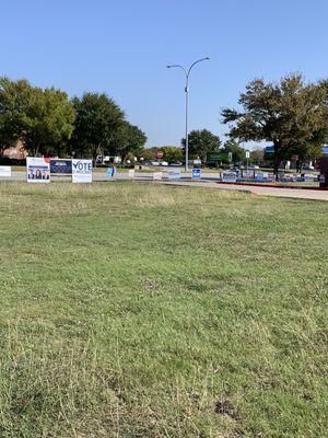 Candidate signs out front of the building