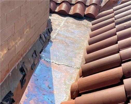 Poor tile roof valley detail. Possible tile roof leak loation