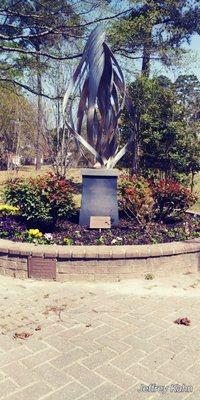 Centerpiece of our Beth Israel Community garden, Eternal Flame sculpture.