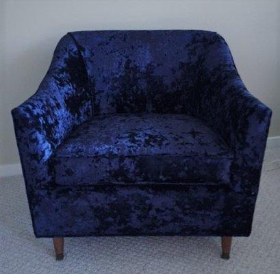 With a soft crushed velvet and some TLC we took this 60s era chair from tired and orange to swanky and blue.