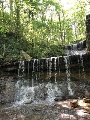 Nice waterfall just inside foliage at end of creek.