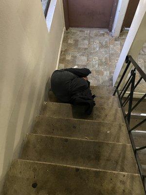 Homeless sleep in the staircases