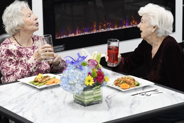 Patient and resident enjoying lunch in our newly renovated dining room.