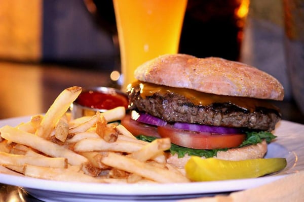 "Sport Heaven" Burger - Choice of 8oz Beef or Turkey burger, served with french fries & pickle.