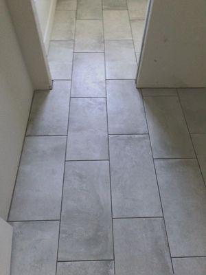 Floor tile installation.