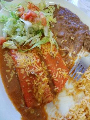 cheesy cheesy enchiladas with guacamole salad and tea. the best deal in Caldwell co period.