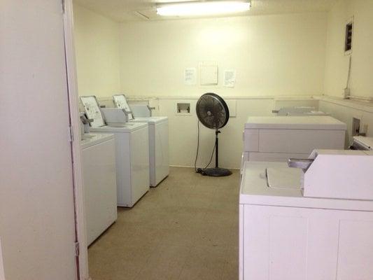 On-Site Laundry Facility.  Rare sight, photo taken moments after the room was actually cleaned for the first time in several months.