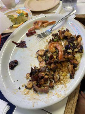 Half finished! Camarones + pulpo al ajillo. A good sized plate with lots of food. Comes with rice also : )