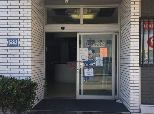 Entrance to the building can be found on the back side of the building (parking lot side).