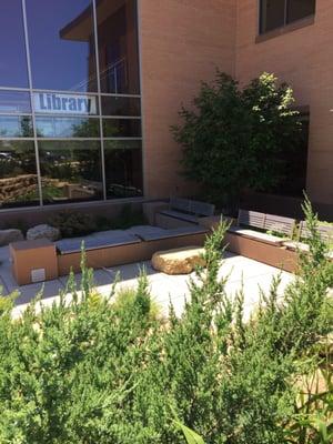 Outdoor seating. Beautiful landscaping.