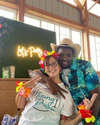 Miranda & Davon dressed up for a luau event. (Owners of Mixing Dreams)