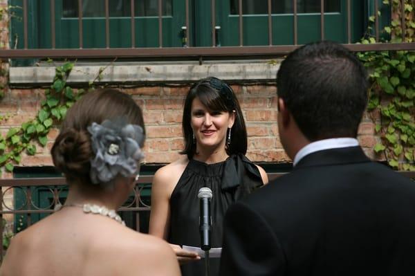 kara was gorgeous in layered grey flower petals with delicate ivory pearls. photo: rick aguilar studios