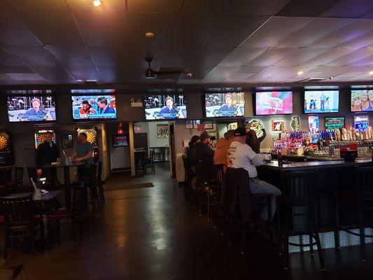 Bar area and doorway that leads to billards area