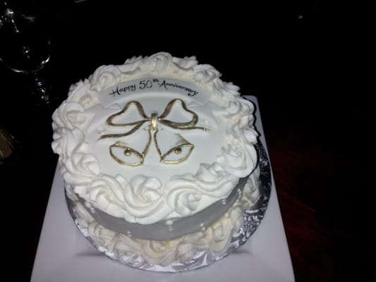 50th Wedding Anniversary cake. Not a single bite went left unfinished. Absolutely the best custom cakes around.