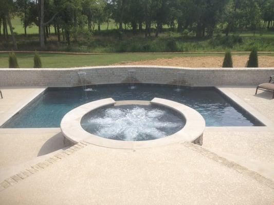 Custom pool, spa, and backyard cooking area in College Grove, TN