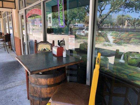 Outside table in front of Taco Lindo