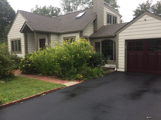 House shown with new roof, skylight and paint job 9-5-2019