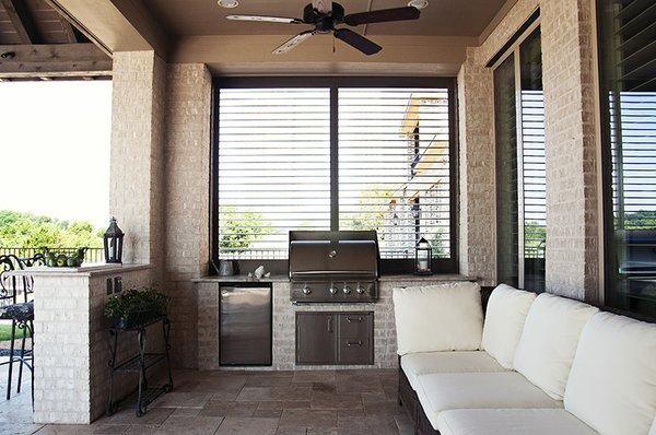 Custom color fixed aluminum shutter on outdoor kitchen- open.