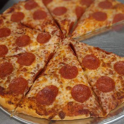 Classic Pepperoni Pizza.  Get two of these slices plus a slushy for only $5!!!