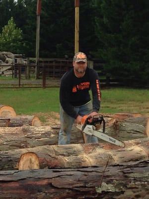 We work year round splitting firewood. Bobby is hard at work sawing wood to be split.