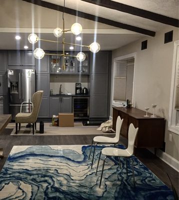 Dining Room chandelier installation on a vaulted ceiling