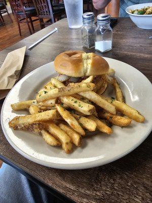 Chilli cheese hamburger with fries.