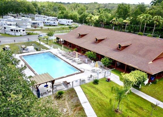 Our beautiful pool next to our main office and multipurpose cabin