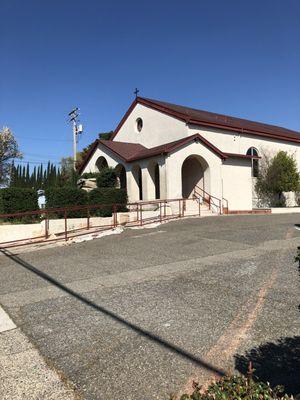 Sidewalk view of church