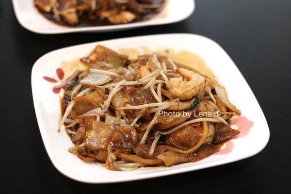 Drunken Noodles with Shrimp ($11.95) - wide rice noodles stir fried together with eggs, bamboo, onions, Thai basil, and beansprouts