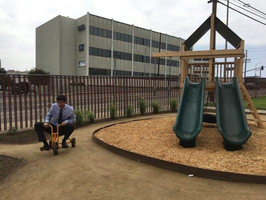 Pastor testing out the new playground