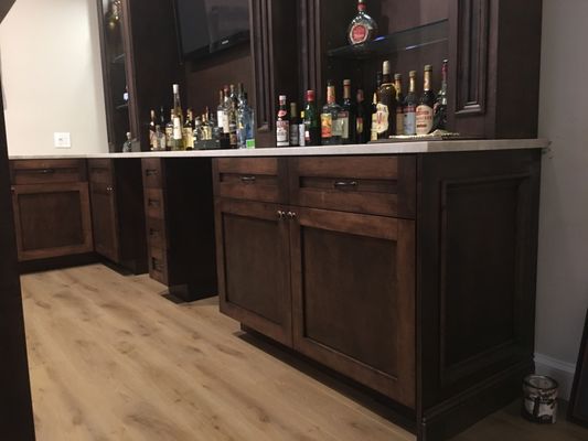 TV Bar, custom cabinets made of maple and stained in chestnut color, finished with varnish.