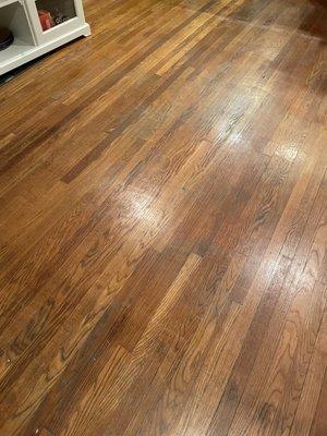 Original wood floors prior to sanding and restaining.