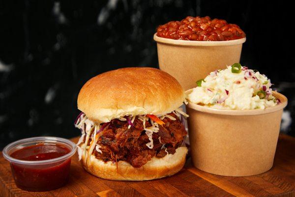 Pulled Pork Sandwich with a side of Baked Beans & Potato Salad