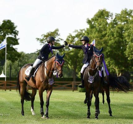 Alex Volpi and Emma Reichow earning a silver medal at Young Riders for Zone 10