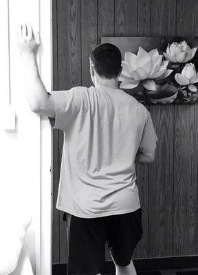 Do you have tight shoulders? Find a doorway and get to work on opening up those pectoral muscles.