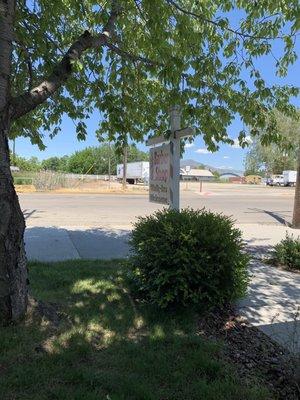 Cherry tree & signage in front