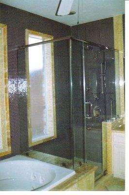 Custom designed 3/8" clear tempered glass (frameless) shower enclosure