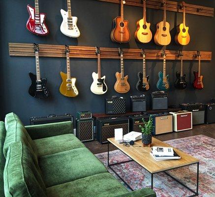 Guitar wall at The Sound Parcel Music Showroom.