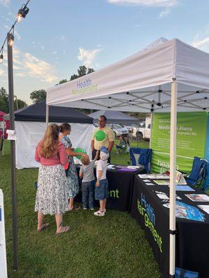 Tim Powers speaking with people at the Shippenville PA Octoberfest event in 2023.