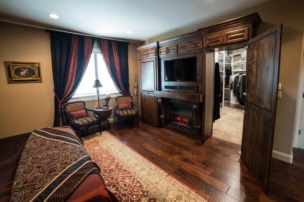 Secret passageway into walk-in closet addition; hidden my custom entertainment center.