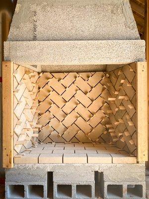 Herringbone firebrick in an Isokern fireplace.