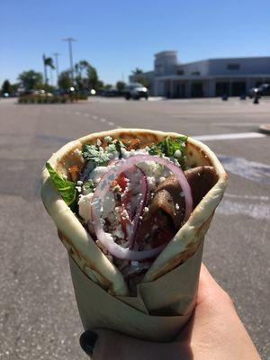 Looking for a house specialty? Then this gyro pita served with homemade tzatziki sauce and feta cheese is the right choice for you.