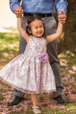 Childhood portrait with daughter and father in Queens park.