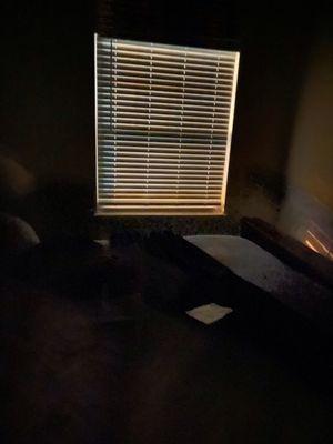 Hard to sleep with no curtains in Master Bedroom with walkway light right outside window