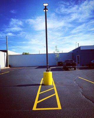 Main entrance/parking lot on the south side of the building, off of Delemere.