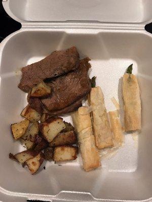 Roast beef, new potatoes, and the phyllo wrapped asparagus. They sent us home with leftovers from the tasting.