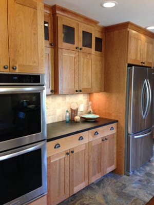 Canton kitchen with fridge closer to cooking & sink