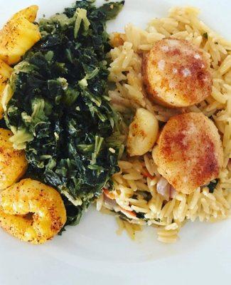 Sautéed Sea scallops, over cheese orzo,mixed greens & blackened Shrimp!!