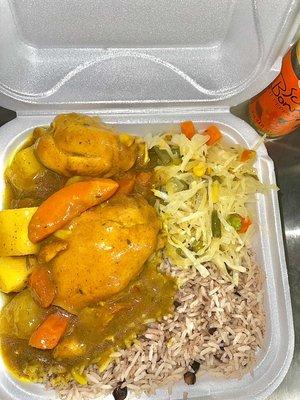 Curry chicken with rice and peas and steam cabbage