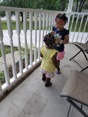 Zoe and Zariah playing with bubbles